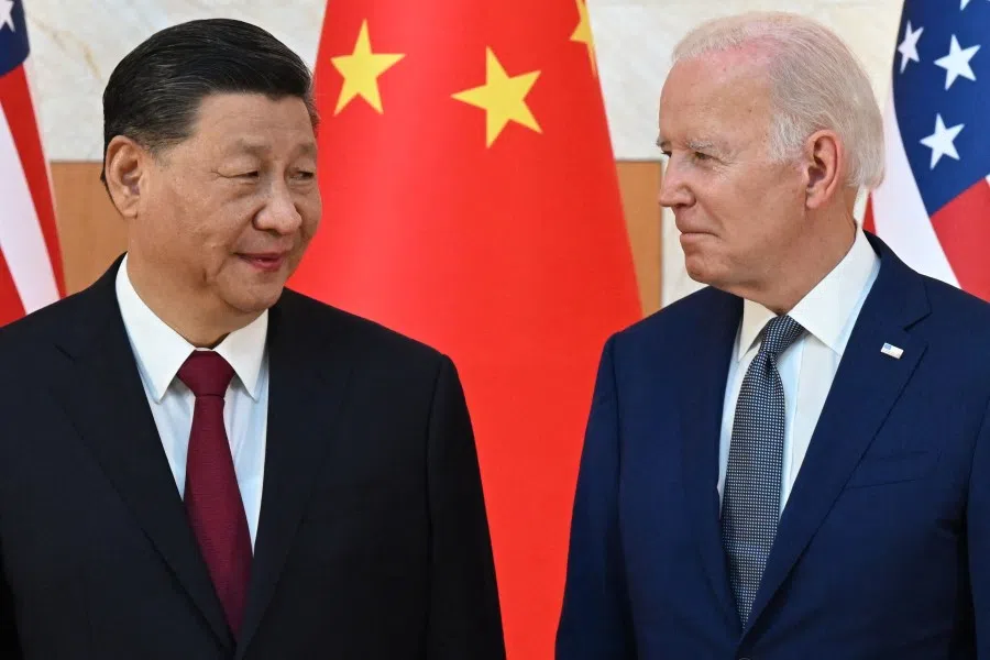 US President Joe Biden (right) and China's President Xi Jinping (left) meet on the sidelines of the G20 Summit in Nusa Dua on the Indonesian resort island of Bali on 14 November 2022. (Saul Loeb/AFP)