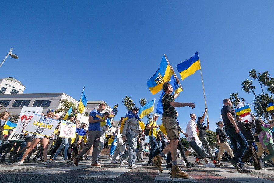Demonstrators march during a rally in support of Ukraine in Santa Monica, California, on 12 March 2022. (Ringo Chiu/AFP)