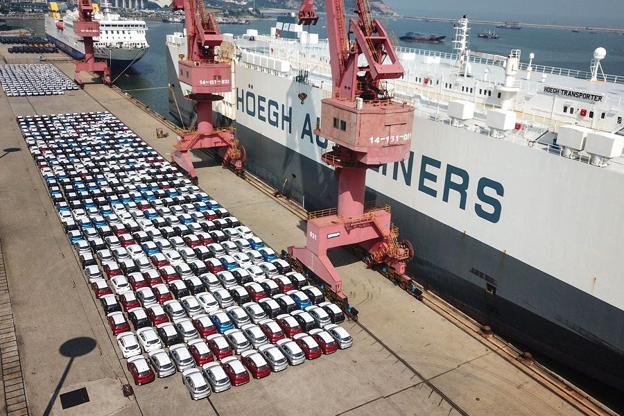 This aerial photo taken on 7 September 2020 shows cars waiting to be exported at a port in Lianyungang, Jiangsu, China. (STR/AFP)