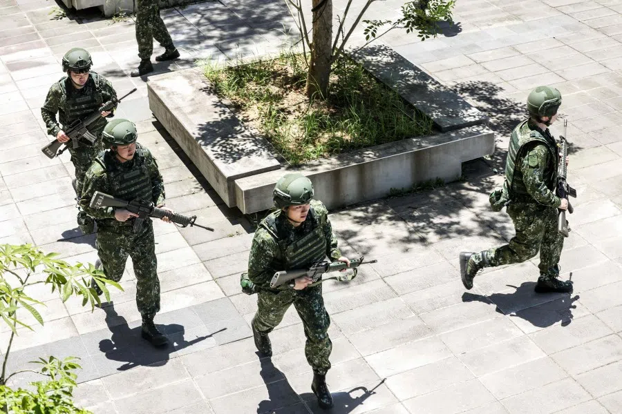 Reservists participate in an urban combat training exercise at the Taipei Tennis Center in Taipei’s Neihu district on 11 June 2025. (I-Hwa Cheng/AFP)