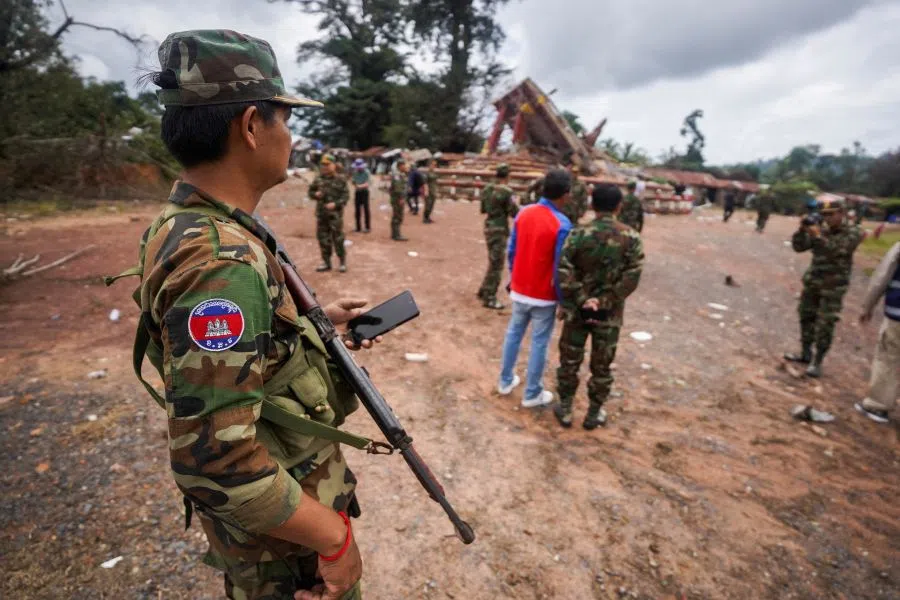 A military personnel takes position at the closed An Ses border checkpoint, also known as Chong Arn Ma in Thai, during an inspection by foreign military attaches from major powers and ASEAN member countries, along with diplomats from 13 countries, after the leaders of Cambodia and Thailand agreed to a ceasefire on 28 July effective midnight, Cambodia, 30 July 2025.