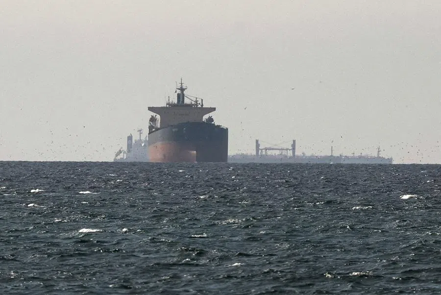 Tankers sail in the Gulf, near the Strait of Hormuz, as seen from northern Ras al-Khaimah, near the border with Oman’s Musandam governance, amid the US-Israeli conflict with Iran, in United Arab Emirates, on 11 March 2026. (Stringer/Reuters)
