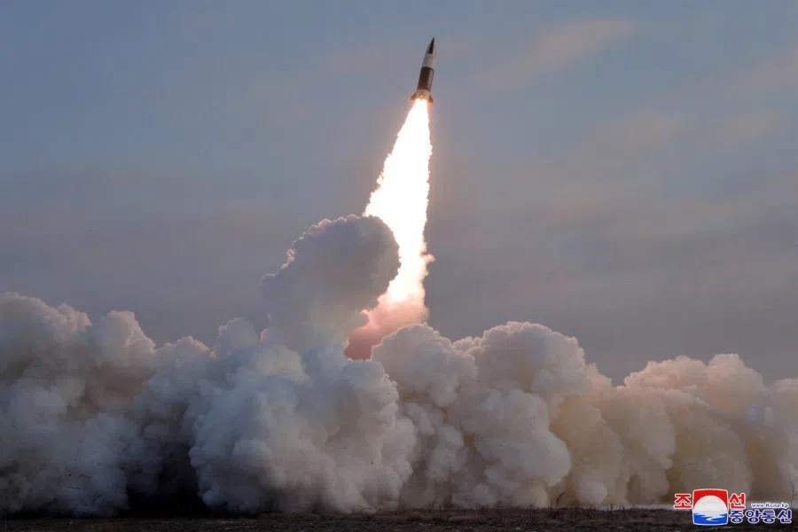 A tactical guided missile is launched, according to state media, at an undisclosed location in North Korea, in this photo released 17 January 2022 by North Korea's Korean Central News Agency (KCNA). (KCNA via Reuters)