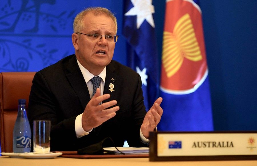 This handout photo taken and released by the Australian Prime Minister's Office on 27 October 2021 shows Prime Minister Scott Morrison attending the ASEAN-Australian Summit at the Parliament House in Canberra. (Adam Taylor/Australian Prime Minister's Office/AFP)