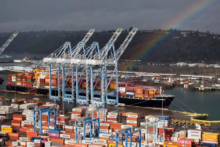 A rainbow over the Port of Tacoma in Tacoma, Washington, US, on 4 March  2025. US President Donald Trump delivered on his threat to hit Canada and Mexico with sweeping import levies and doubled an existing charge on China, spurring swift reprisals that plunged the world economy into a deepening trade war.