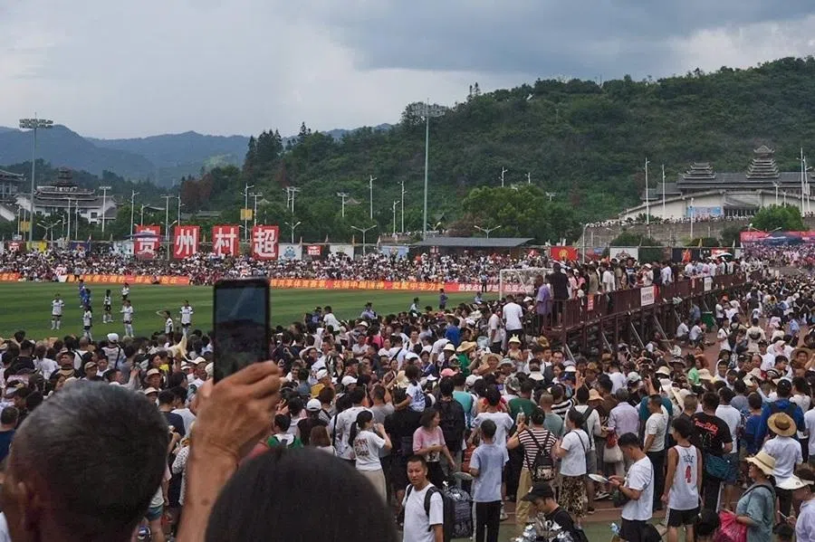Inside the Rongjiang football stadium where the final matches of the village super league are being played, July 2023.
