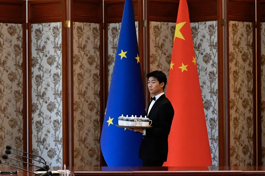 A staff member prepares for the arrival of Chinese Vice-Premier Ding Xuexiang and EU Executive Vice-President for Clean, Just and Competitive Transition, Teresa Ribera, during the 6th China-EU High-Level Environment and Climate Dialogue at the Diaoyutai State Guest House in Beijing, China, on 14 July 2025.