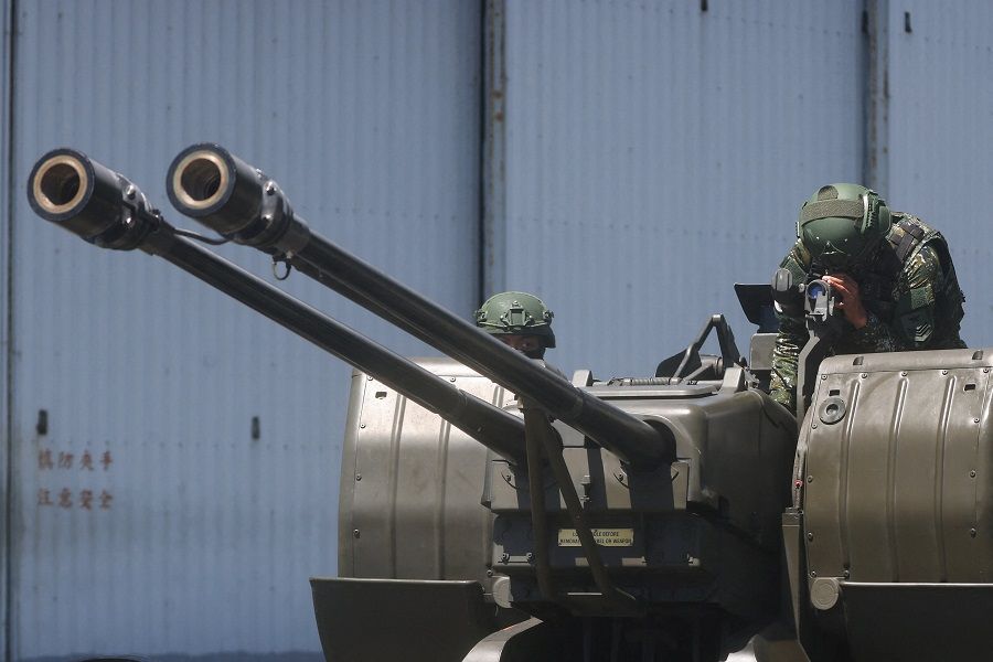 Soldiers demonstrate a GDF-006 anti-aircraft gun to the media in Hualien, Taiwan, 18 August 2022. (Ann Wang/Reuters)