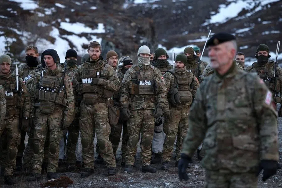 Danish soldiers take part in a drill near Buksefjord hydroelectric power plant, during the visit of Denmark’s Defence Minister Troels Lund Poulsen and Chief of Defence General Michael Wiggers, in Greenland, on 31 January 2026. (Stoyan Nenov/Reuters)