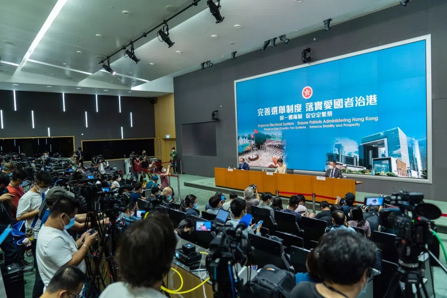 Hong Kong's chief executive Carrie Lam (centre) speaks at a news conference in Hong Kong, China, 30 March 2021. (Chan Long Hei/Bloomberg)