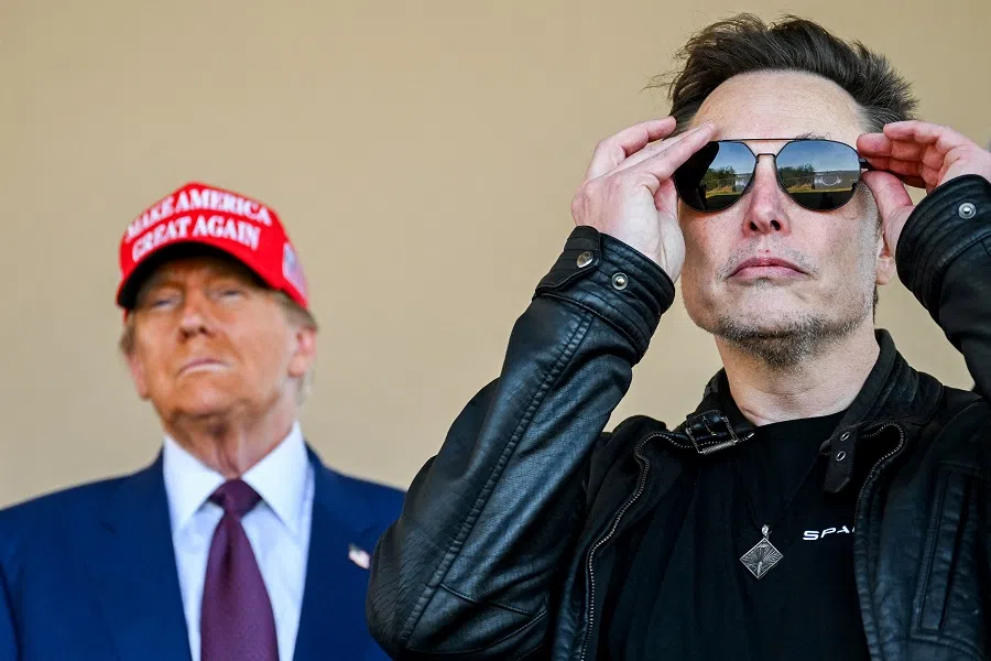 US President-elect Donald Trump and Elon Musk watch the launch of the sixth test flight of the SpaceX Starship rocket in Brownsville, Texas, US, on 19 November 2024. (Brandon Bell/via Reuters)
