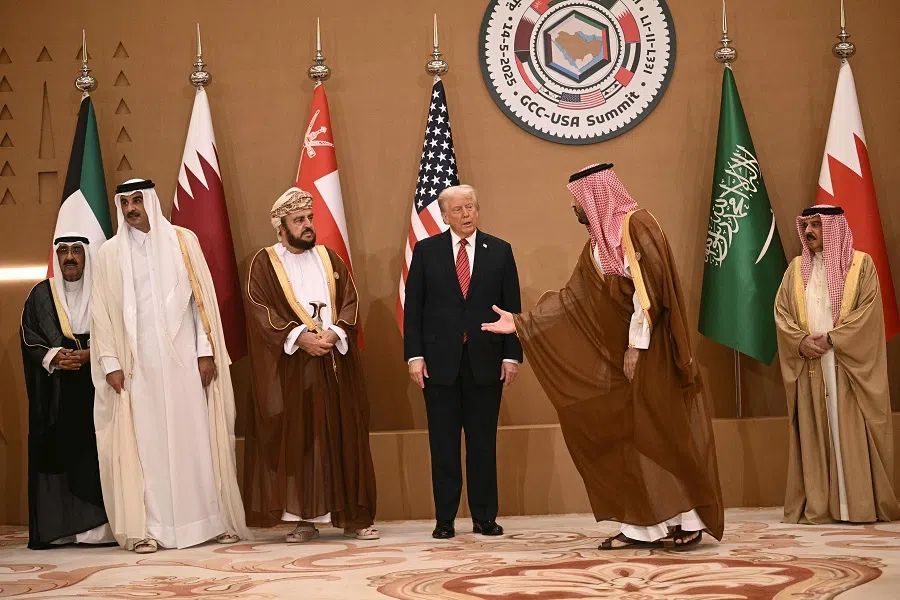 US President Donald Trump poses with Gulf leaders and officials during the Gulf Cooperation Council summit in Riyadh on 14 May 2025. (Brendan Smialowski/AFP)