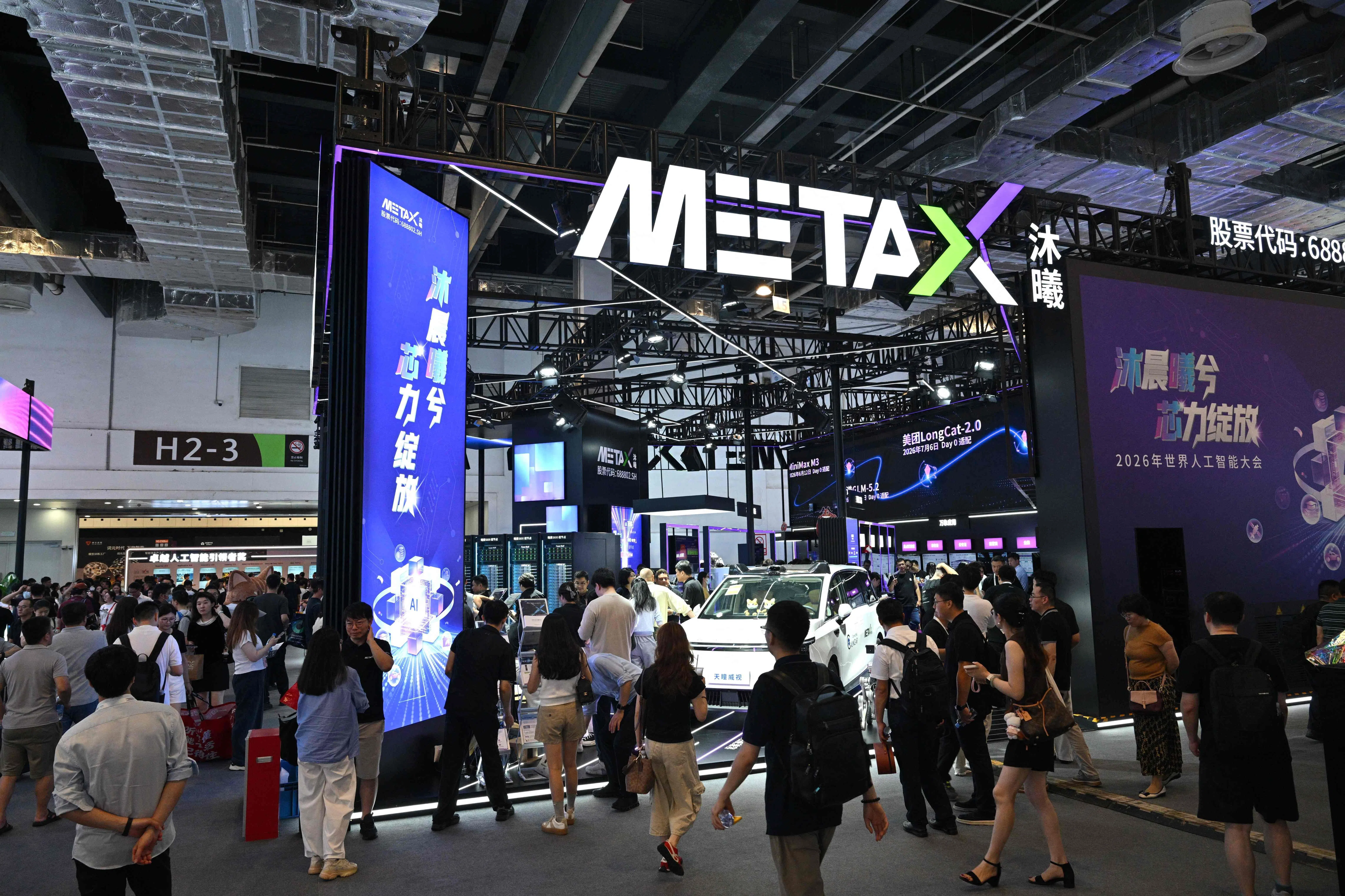 People visit the MetaX booth during the World Artificial Intelligence Conference (WAIC) in Shanghai on 18 July 2026.
