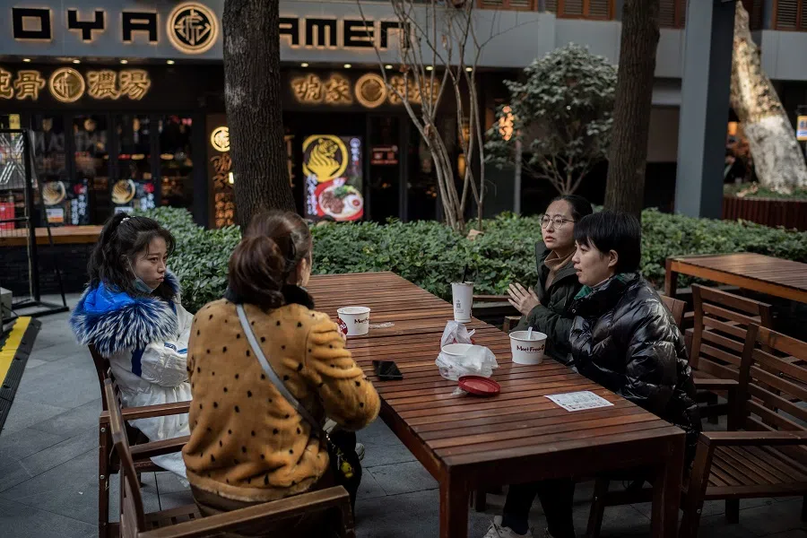 Having a conversation is the tip of the iceberg of communication in learning a language. (Nicolas Asfouri/AFP)