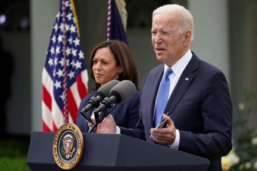 U.S. President Joe Biden, accompanied by Vice President Kamala Harris, speaks at the Rose Garden of the White House in Washington, U.S., 13 May 2021. (Kevin Lamarque/Reuters)