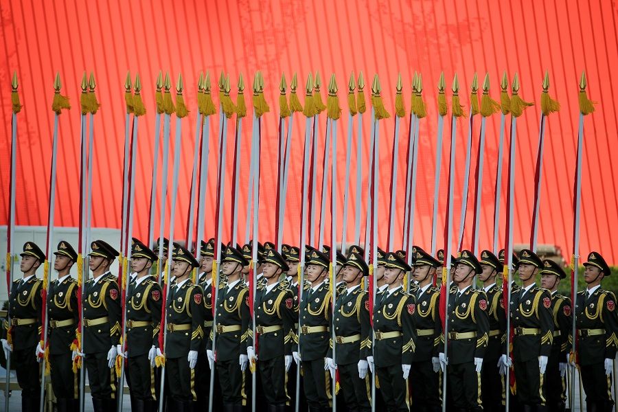 Members of the honour guard prepare for a welcoming ceremony at the Great Hall of the People in Beijing, China, 25 October 2019. (Jason Lee/Reuters)