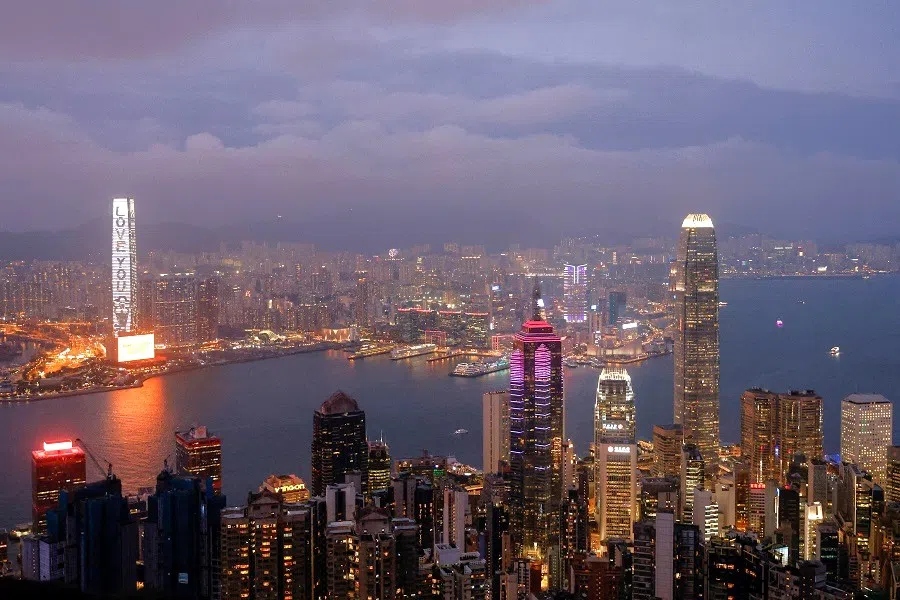 An evening view of the Central district and Victoria Harbour in Hong Kong, China, on 9 May 2023. (Tyrone Siu/Reuters)