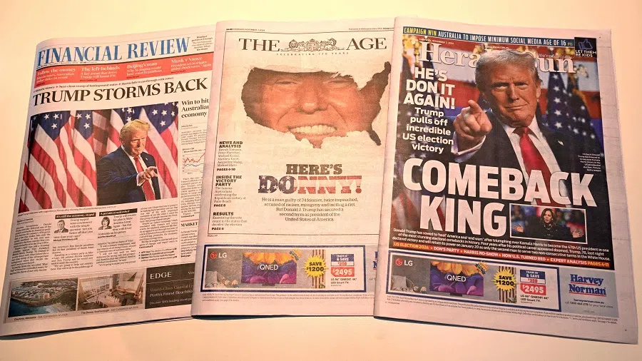 The front pages of the morning newspapers in Melbourne, Australia, on 7 November 2024, show the reaction to the re-election of US President-elect Donald Trump. (William West/AFP)