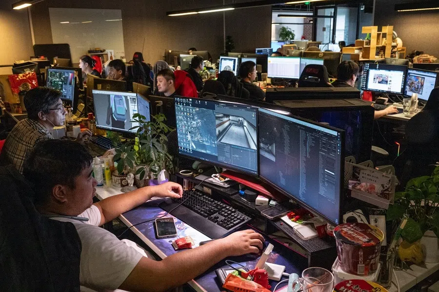 Employees work at the Hero Games offices in Beijing, China, on 3 September 2024. (Bloomberg)