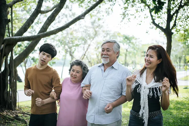 happy  family walking outdoor in the park