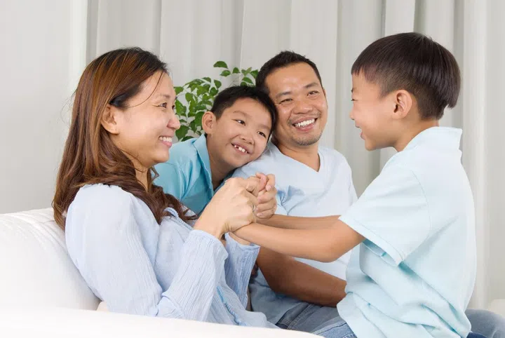 44146025 - asian family having fun at home