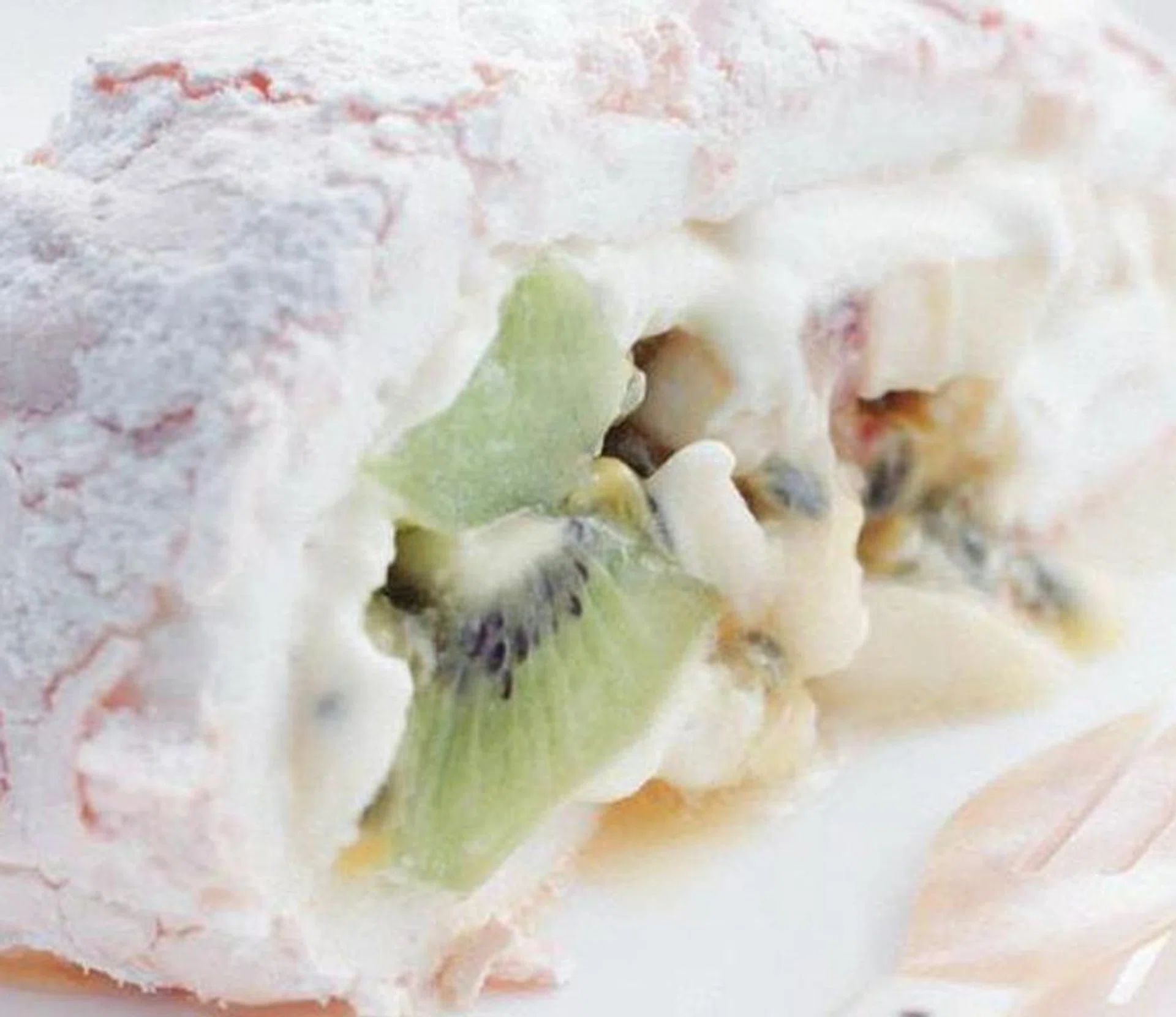 Pavlova Roll With Banana, Kiwi & Passionfruit