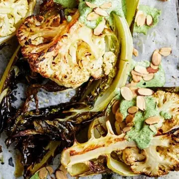 Cauli Wedges With Green Tahini & Almonds