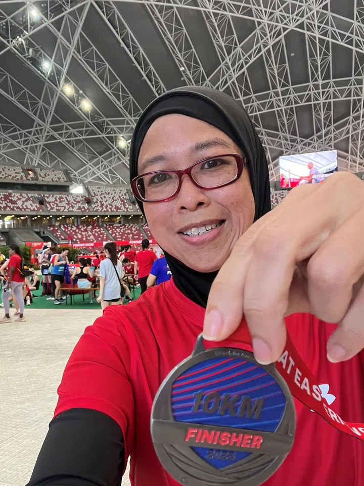 Sharifah after completing her first 10km Great Eastern Women's Run in 2023. Photo credit: Siti Sharifah bte Osman