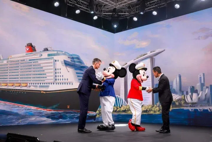 Chairman of Disney Parks, Experiences and Products Josh D'Amaro (left) and Singapore Tourism Board chief executive Keith Tan at the launch of a new partnership between Disney Cruise Line and the Singapore Tourism Board. ST Photo: Gavin Foo