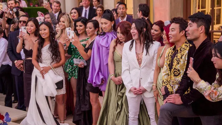 Bling Empire. (L to R) Kelly Mi Li, Jamie Xie, Anna Shay, Guy Tang, Kim Lee, Kane Lim, Kevin Kreider in Bling Empire. Cr. Courtesy Of Netflix © 2022