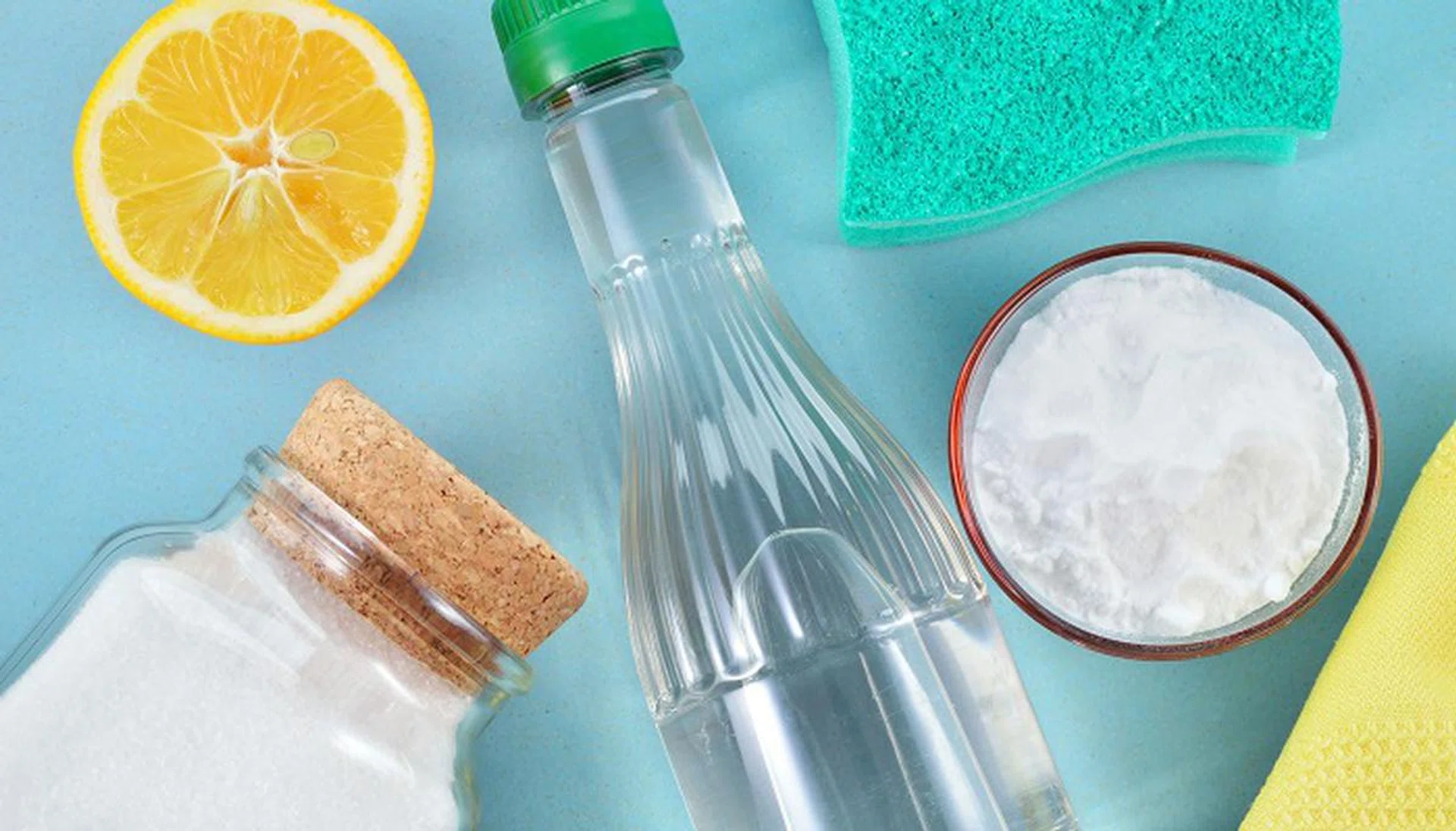 Eco-friendly natural cleaners. Vinegar, baking soda, salt, lemon and cloth. Homemade green cleaning.