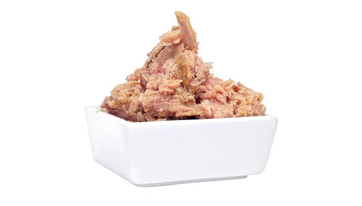 10003025 - a bowl of tuna on a white background