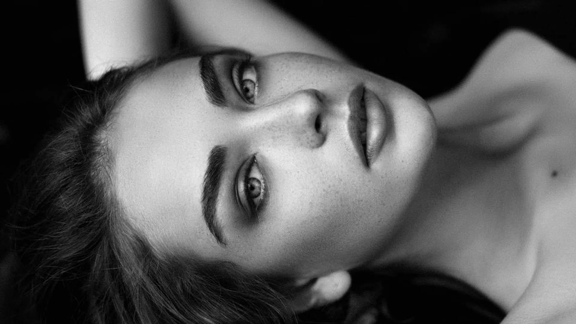 Sensual black-and-white photograph of a woman
