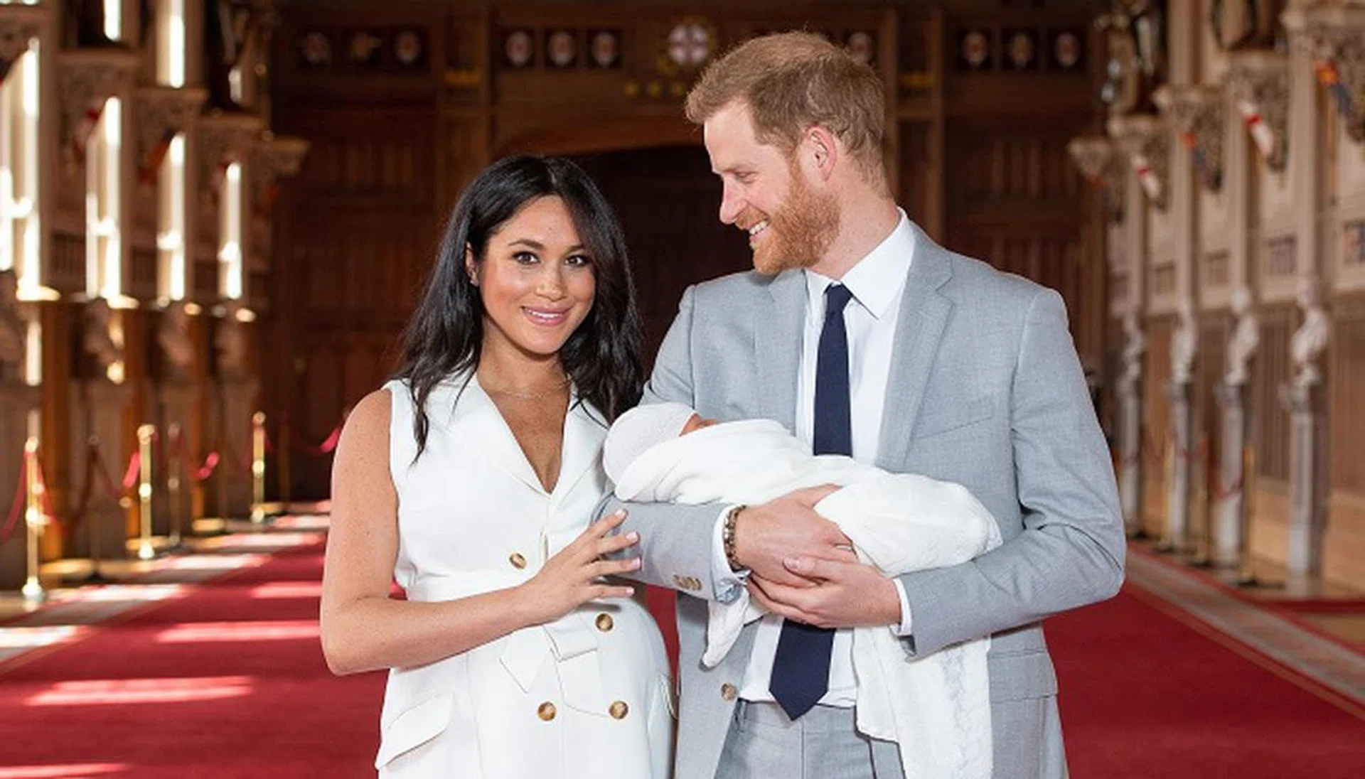 The Duke and Duchess of Sussex with their baby son, who was born on Monday morning, during a photocall in St George's Hall at Windsor Castle in Berkshire. 