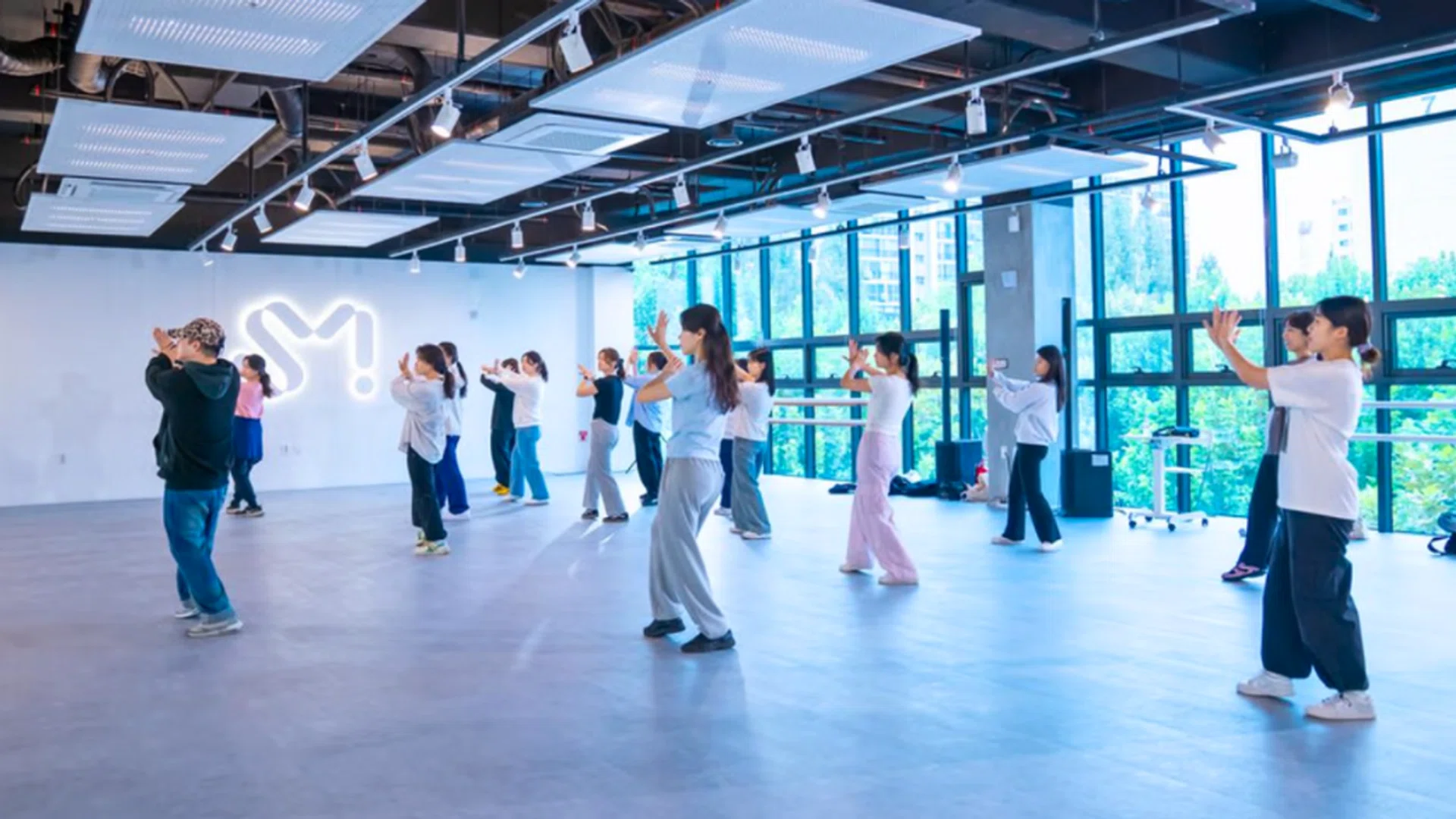 Students taking a dance lesson at the Seoul campus of SM Universe. A Singapore campus will open at *Scape come June 2025. Photo credit: SM UNIVERSE