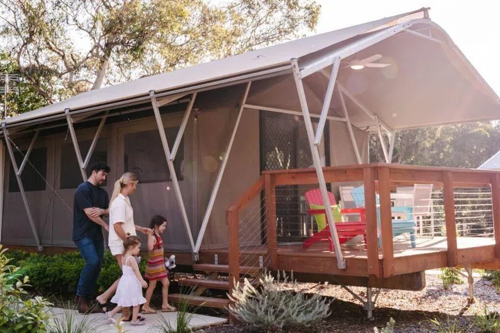 Safari-style tents, a pool and the SKYwalk at Port Stephens Koala Sanctuary, New South Wales, Australia