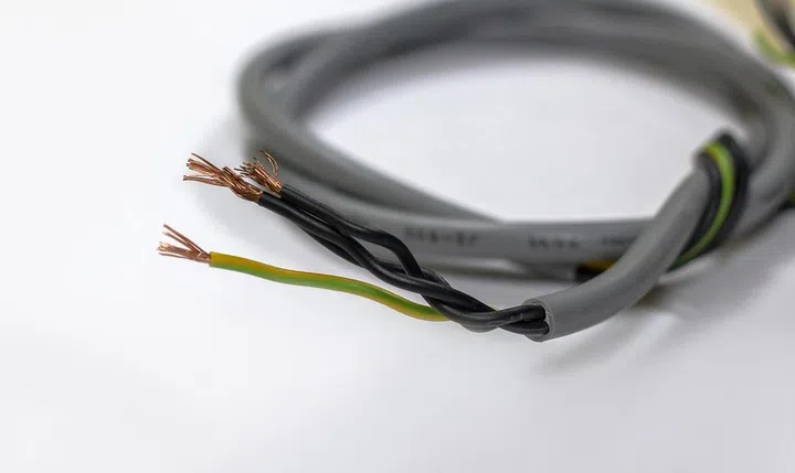 closeup of wire electric cable on a white background,A jumble of multi colored wires