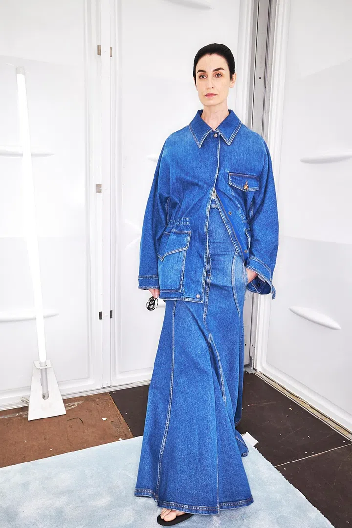 A denim maxi skirt with a mermaid silhouette as seen at brands like Burberry and instantly gives the garment a dressed-up look. Credit: Burberry