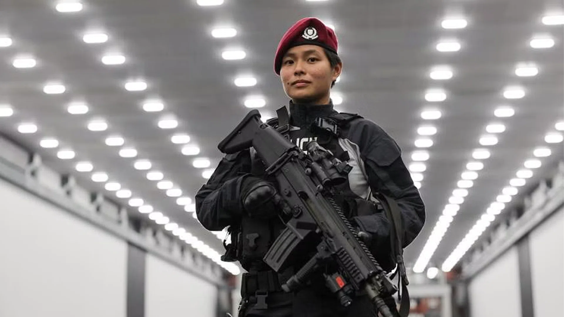 ASP Candy Ko also has the distinction of being the first female officer to be given the Special Operations Command red beret, a symbol of “bravery and sacrifice”. ST PHOTO: GIN TAY