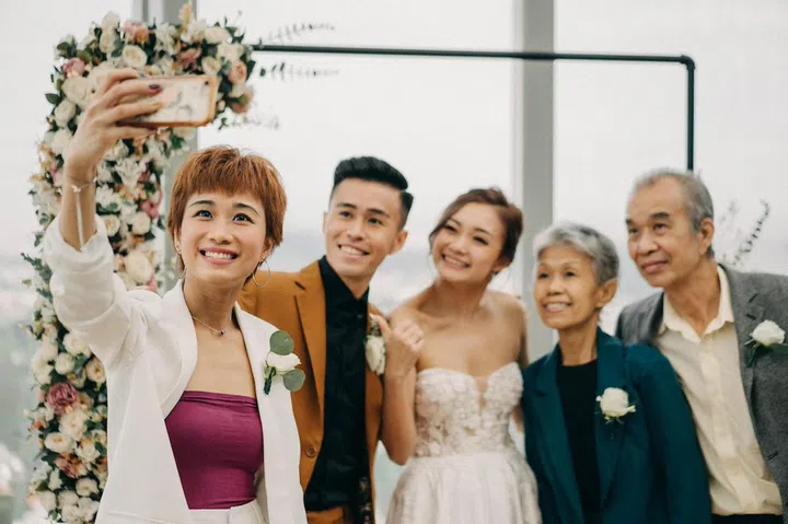 From left: May, Marcus, Hui Lin, Mama Leong and Hui Lin's father-in-law at the wedding. Photo: Toh Hui Lin