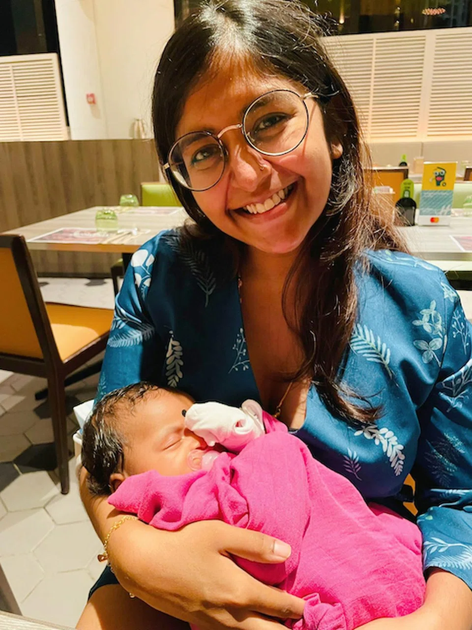 Rupini and her new baby. Photo: Rupini Piragasam