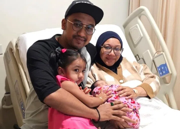 Aqmar, Firdaus and their daughters at the hospital. Photo: Aqmar and Firdaus