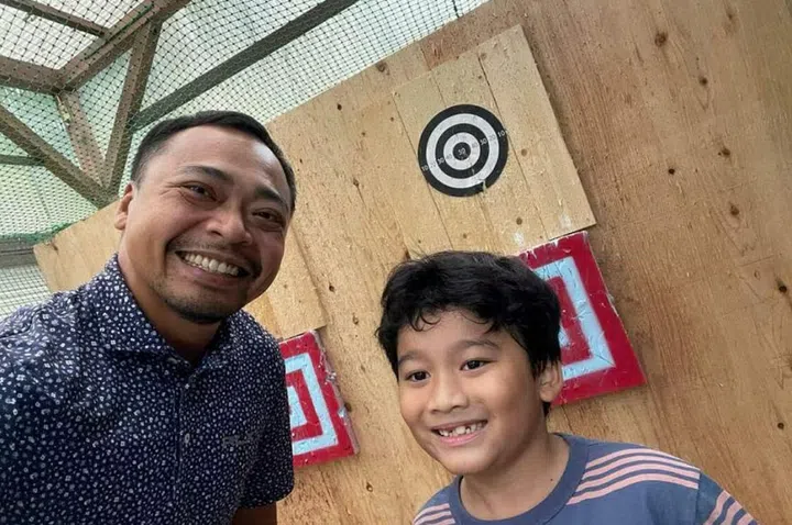 Mr Ruperto Ancajas gave his seven-year-old son Oliver a taste of managing a travel allowance when they went to Nagoya, where they visited the Iga-ryu Ninja Museum. Photo: Courtesy of Ruperto Ancajas