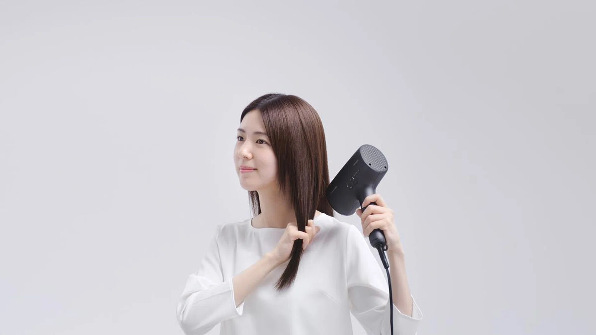 With built-in sensors and moisture-adding technology, Panasonic's EH-NA0J hair dryer works to protect your mane while styling. Credit: Panasonic