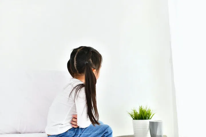 Little girl is being annoyed by an adult.