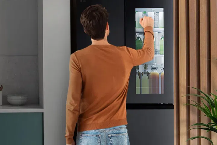 Two quick knocks on the tinted glass panel illuminate the interior, letting you check the fridge’s contents without opening the door. Credit: LG Electronics Singapore
