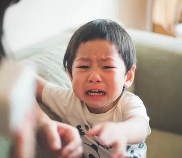 child throwing tantrum