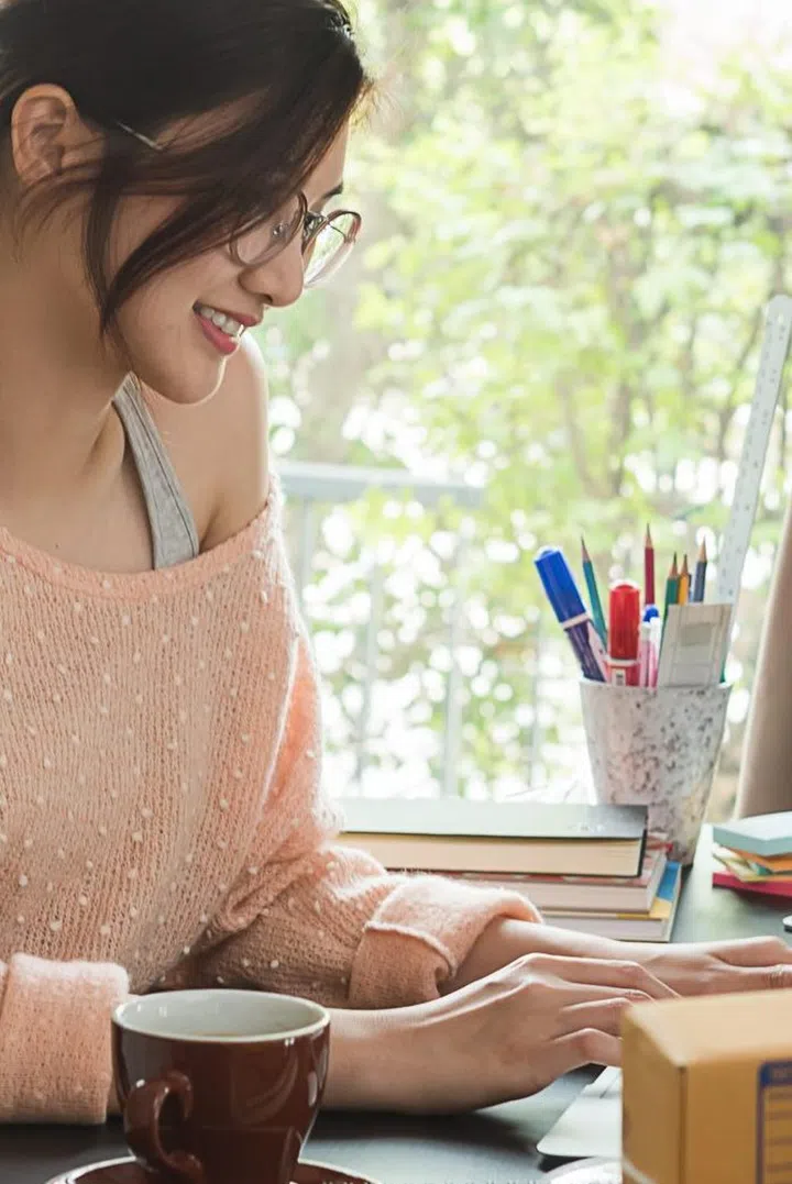 Asian woman work from home during corona virus, COVID-19 out break use laptop for teleconference with her teamates