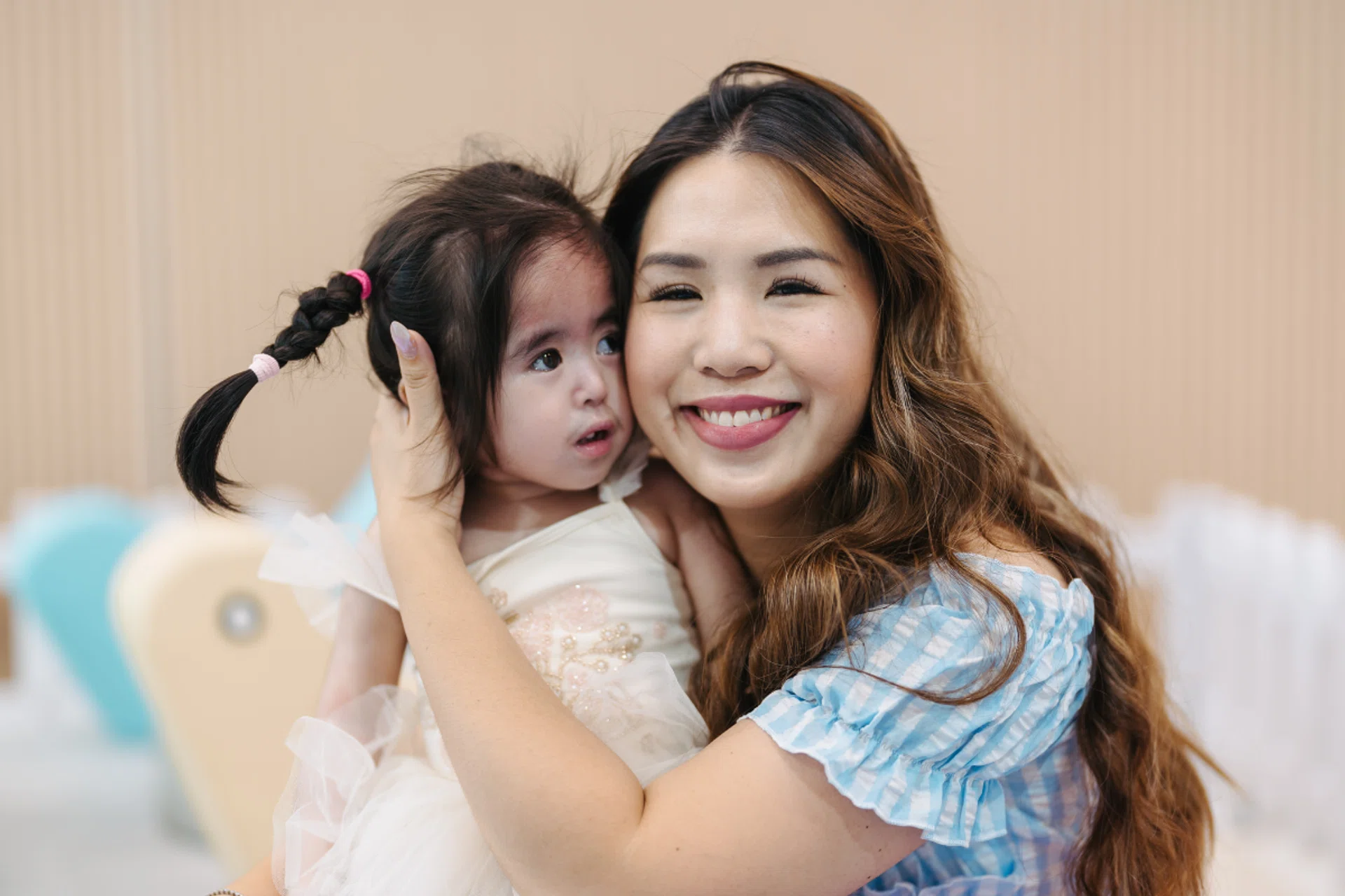 Singaporean mum Chantal Choo and her daughter Camila, who has a rare genetic condition