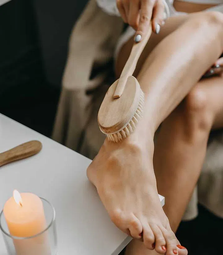 Generally, there are two schools of thought here: dry brush before or after showering. You will need the help of a body oil or lotion as well.